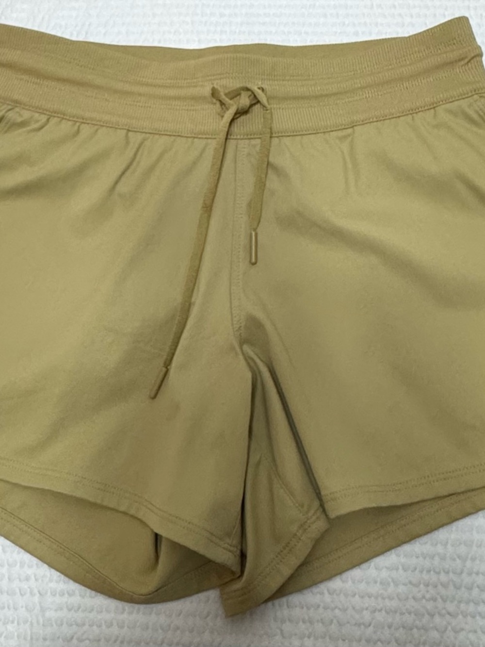 The  north  face Women’s Athletic Drawstring Shorts in Khaki invisible pocket